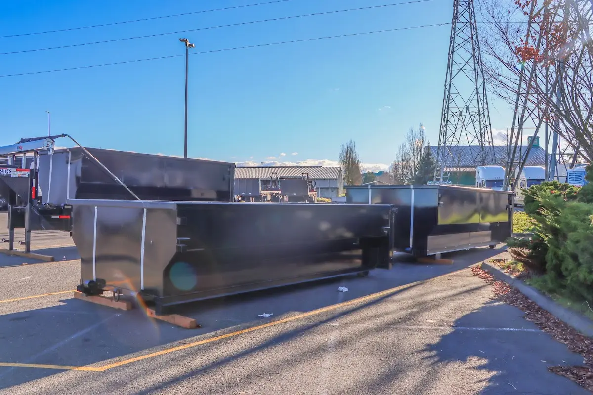 Roll-off dumpster ready for waste disposal at job site for Construction Dumpster Rental in Buford